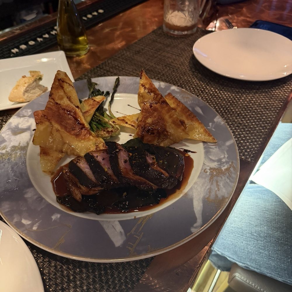 L'etoile Restaurant - Pam seared maple leaf duck breast with a Pinot noir sauce - French Near Me - Edgartown, Massachusetts
