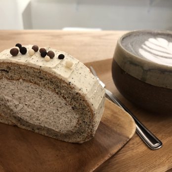 Little Pebbles - Houjicha roll cake and black sesame latte - Desserts Near Me - Toronto, Ontario Little Pebbles - Houjicha roll cake and black sesame latte - Desserts Near Me - Toronto, Ontario