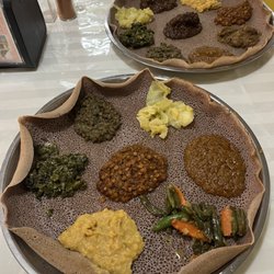 Gojo Ethiopian Restaurant - Vegetarian combo in front, meat combo in back
