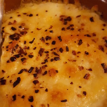 Romana - Warmer Käse schmackhaft gewürzt - Pizza Near Me - Rödermark, HE Romana - Warmer Käse schmackhaft gewürzt - Pizza Near Me - Rödermark, HE