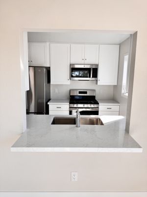 Kitchen remodel San Clemente 2024 - This remodel was done in an old kitchen that was outdated and out of style. We added new cabinets, appliances and a beautiful white quartz countertop, to give it a new modern look. Kitchen remodel San Clemente 2024 - This remodel was done in an old kitchen that was outdated and out of style. We added new cabinets, appliances and a beautiful white quartz countertop, to give it a new modern look.