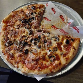 Ulysses' Restaurant and Lounge - Large deluxe pizza - American Near Me - Tukwila, Washington Ulysses' Restaurant and Lounge - Large deluxe pizza - American Near Me - Tukwila, Washington