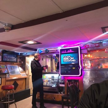 El Mondonguito - a man standing in a diner - Puerto Rican Near Me - Roxbury, Massachusetts El Mondonguito - a man standing in a diner - Puerto Rican Near Me - Roxbury, Massachusetts