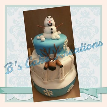 B's Cake Kreations - a cake with a snowman on top - Cupcakes Near Me B's Cake Kreations - a cake with a snowman on top - Cupcakes Near Me