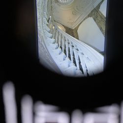 In same room as museum model were sketches w/peepholes showing interiors of those buildings