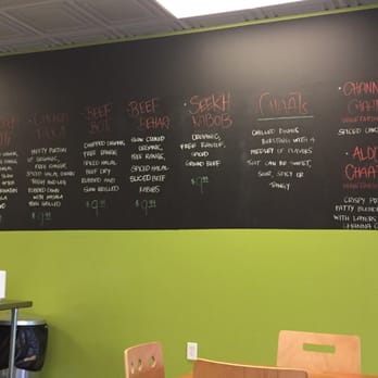 Chapati - The menu is on the wall. They have specials where you can do 1/2 of one dish and 1/2 of another for a good price. - Indian Near Me - Indianapolis, Indiana