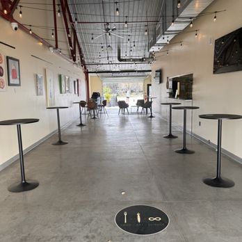Bagel Babe - the inside of a restaurant with tables and chairs - Bagels Near Me - St. Petersburg, Florida Bagel Babe - the inside of a restaurant with tables and chairs - Bagels Near Me - St. Petersburg, Florida