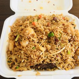 a close up of a take out container of food