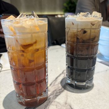Niyom Thai Kitchen - Thai ice tea (left) and Thai ice coffee (right) - Thai Near Me - Flushing, New York Niyom Thai Kitchen - Thai ice tea (left) and Thai ice coffee (right) - Thai Near Me - Flushing, New York