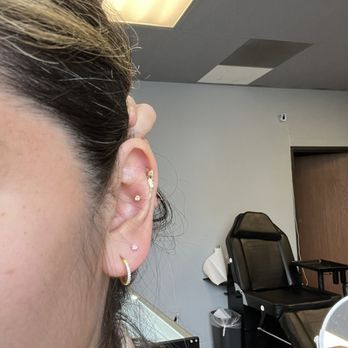 Baron Art Tattoo Piercing Studio - Lower lobe piercing - Tattoo Near Me - Long Beach, California Baron Art Tattoo Piercing Studio - Lower lobe piercing - Tattoo Near Me - Long Beach, California