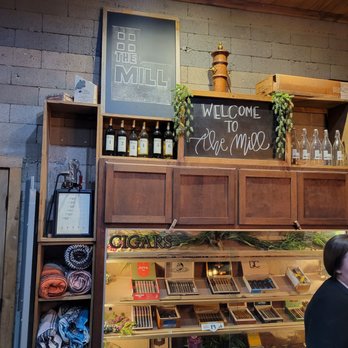 The Mill Wine Bar & Event Venue - a man standing in front of the counter - Wine Bars Near Me - Abilene, Texas The Mill Wine Bar & Event Venue - a man standing in front of the counter - Wine Bars Near Me - Abilene, Texas