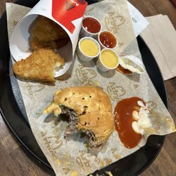 Arby's - Double Beef and Cheddar with a large Potato Cakes, and sauces for days!