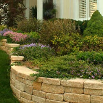 Greentouch Lawn & Tree - Retaining Walls and Garden Beds Around the House - Landscaping Near Me - Topeka, Kansas Greentouch Lawn & Tree - Retaining Walls and Garden Beds Around the House - Landscaping Near Me - Topeka, Kansas