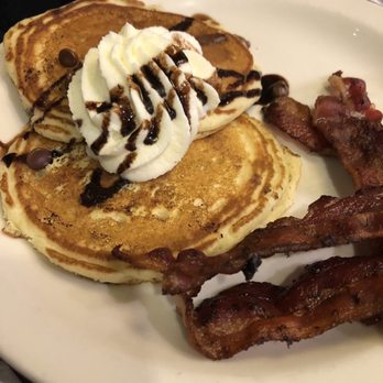 Bakers Square - a plate of pancakes and bacon - American Near Me - Mentor, Ohio