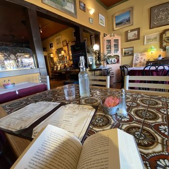 Still Life Cafe - an open book and a glass of water - Specialty Food Near Me - Independence, California