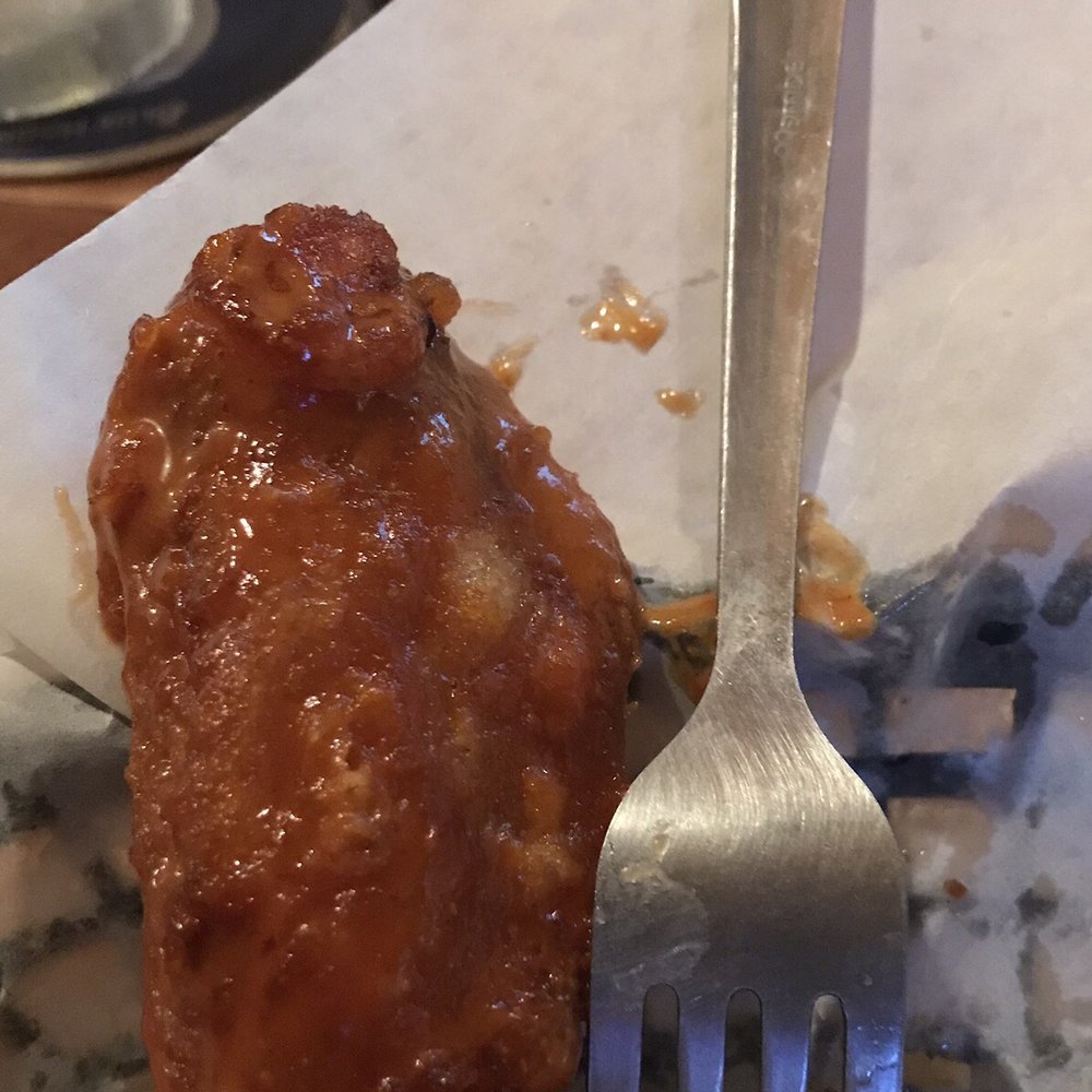 Beer Mussels Bar & Grille - a fork and half eaten chicken - Bars Near Me - Hellertown, Pennsylvania