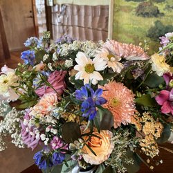 Blooms Floral Shop & Studio - Bridal bouquet, the silver dollar eucalyptus and the yarrow really made the bouquet a stunner. Bride almost messed up her makeup seeing it.