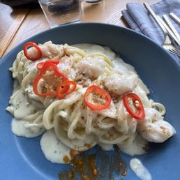 Bucatini with shrimp (the red smear was me trying someone else's food sorry) Bucatini with shrimp (the red smear was me trying someone else's food sorry)