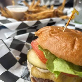 Ultimate Burger - Cheeseburger w/cheddar, pickle, fresh lettuce and tomato. Fries and aioli. - Burgers Near Me - Kailua-Kona, Hawaii Ultimate Burger - Cheeseburger w/cheddar, pickle, fresh lettuce and tomato. Fries and aioli. - Burgers Near Me - Kailua-Kona, Hawaii