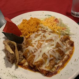 Chicken enchiladas, beans and rice. I liked all of it. Nicely presented too!