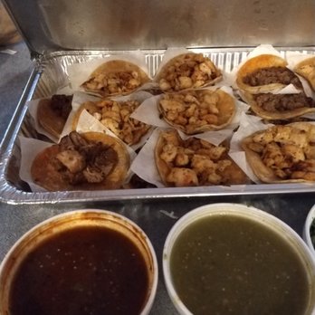 Taqueria Los Comales - Taco tray with red and green sauces. - Mexican Near Me - Evergreen Park, Illinois Taqueria Los Comales - Taco tray with red and green sauces. - Mexican Near Me - Evergreen Park, Illinois