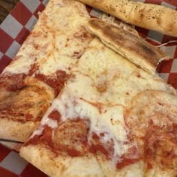 Cheese slices after pouring grease off Cheese slices after pouring grease off