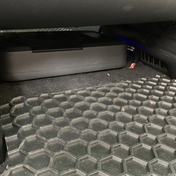 United Car Stereo - Under seat compact 8" sub in a Tesla Model X - Car Stereo Installation Near Me - Dublin, California