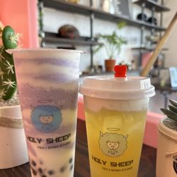 Holy Sheep Tea & Boba Studio - Taro Tornado with boba super creamy. And a White Peach Oolong Tea with cheese foam and aloe vera jelly so refreshing.