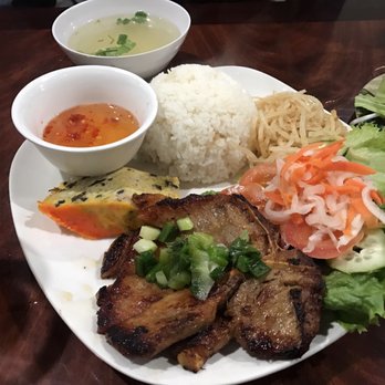Nho Kitchen - Com tam dac biet - Broken rice combination plate with grilled pork and side of soup - Vietnamese Near Me - Fresno, California Nho Kitchen - Com tam dac biet - Broken rice combination plate with grilled pork and side of soup - Vietnamese Near Me - Fresno, California