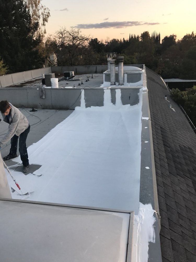 Slide of Flat Roofing Pros