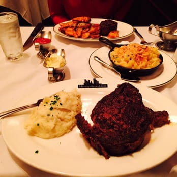Metropolitan Grill - Blacked prime rib with mashed potatoes and a side of lobster mac & cheese for the table. - American Near Me - Seattle, Washington