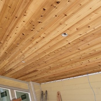 Phine-Crafted Construction - a wooden ceiling and a window - General Contractors Near Me
