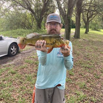 Lott Bros - This is the dream fish of my youth. Took 40 years but Mr. Peacock Bass ate Lott Bro's live bait!! - Outdoor Gear Near Me - North Palm Beach, Florida