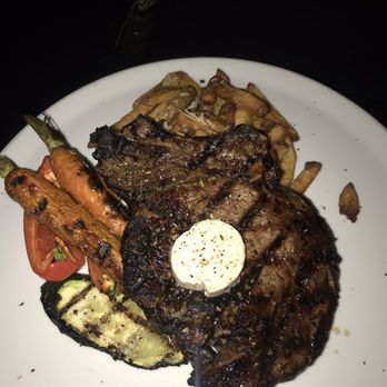 Maison Saint-Paul - 45 Day aged Rib steak Parmesan fries, grilled vegetables, truffle red wine butter - Champagne Bars Near Me - Montreal, Quebec Maison Saint-Paul - 45 Day aged Rib steak Parmesan fries, grilled vegetables, truffle red wine butter - Champagne Bars Near Me - Montreal, Quebec