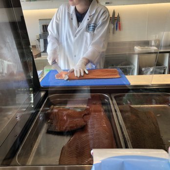 Schmaltz Appetizing - Cutting the salmon - Delis Near Me - Toronto, Ontario Schmaltz Appetizing - Cutting the salmon - Delis Near Me - Toronto, Ontario