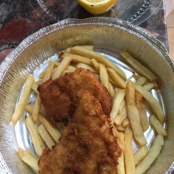 Coolidge Corner Clubhouse - Fish and chips w/o lemon and tartare sauces - Sports Bars Near Me - Brookline, Massachusetts