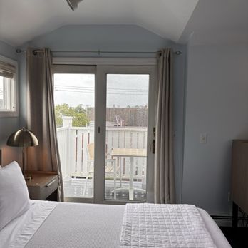 Brasswood Inn - One of two balconies in the Fitzgerald penthouse suite. - Hotels Near Me - Provincetown, Massachusetts Brasswood Inn - One of two balconies in the Fitzgerald penthouse suite. - Hotels Near Me - Provincetown, Massachusetts