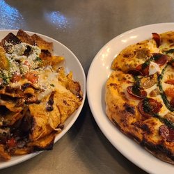 DESTIHL Restaurant & Brew Works - Guajillo Chicken Nachos & Sausage and pepperoni stone oven pizza
