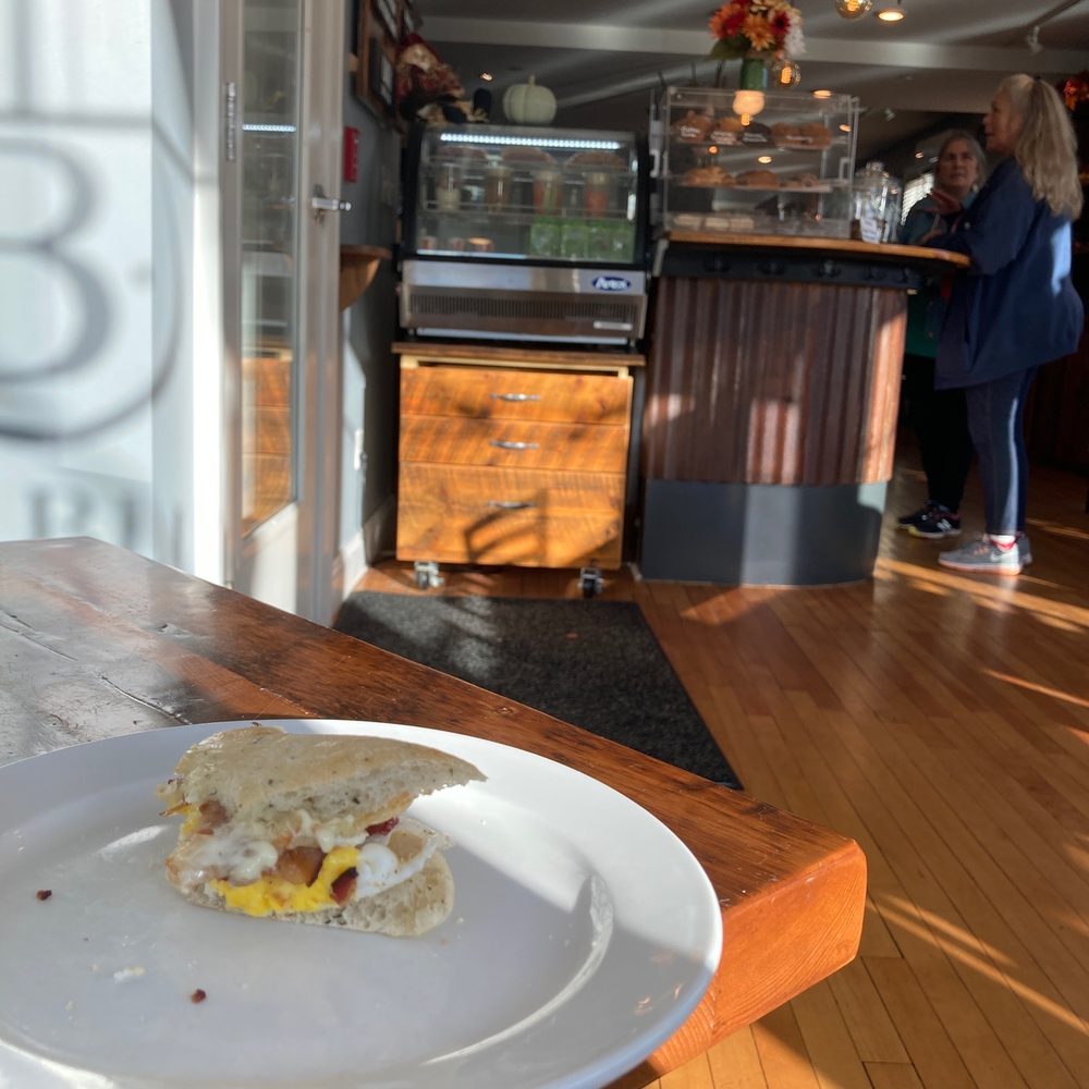 The Blue - a white plate with a sandwich on it - Coffee & Tea Near Me - Kennebunk, Maine The Blue - a white plate with a sandwich on it - Coffee & Tea Near Me - Kennebunk, Maine