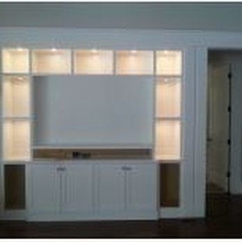 Top Notch - a living room with built in entertainment center - General Contractors Near Me - Kennesaw, Georgia