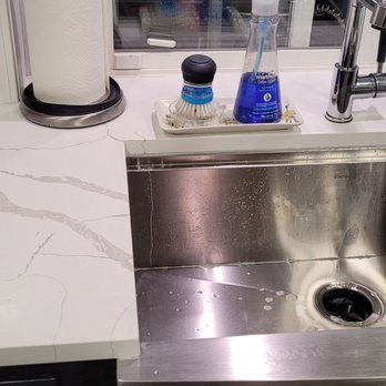 Granite and Marble Specialties - Attention to detail around farm sink and window - Countertop Installation Near Me - Kent, Washington Granite and Marble Specialties - Attention to detail around farm sink and window - Countertop Installation Near Me - Kent, Washington