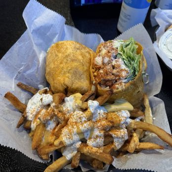 The Wild Goose Bar & Grill - Buffalo Chicken Wrap with Wild Fries - Sports Bars Near Me - Chicago, Illinois The Wild Goose Bar & Grill - Buffalo Chicken Wrap with Wild Fries - Sports Bars Near Me - Chicago, Illinois