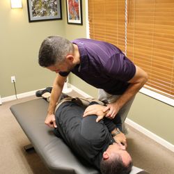 Quality Life Chiropractic & Massage - Chiropractic adjustment by Rochester MN Chiropractor Dr. Matt Suntken.