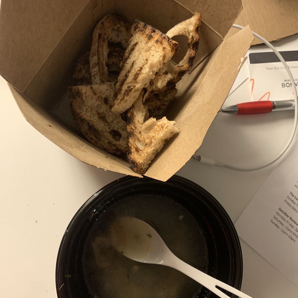 Corinne Austin - Burn sourdough bread and basically broth. To be fair I have had three bites of this and ate most of the noodles in those three bites. - New American Near Me - Austin, Texas Corinne Austin - Burn sourdough bread and basically broth. To be fair I have had three bites of this and ate most of the noodles in those three bites. - New American Near Me - Austin, Texas