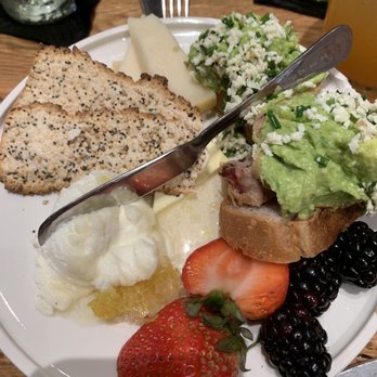 The Rustic - Cheese spread and avocado toast with fruit - Bars Near Me - Houston, Texas The Rustic - Cheese spread and avocado toast with fruit - Bars Near Me - Houston, Texas