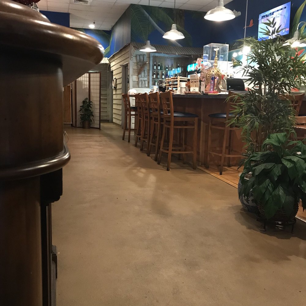 Sabai - Cozy place. Clean. Booths obscured from view on the left, a couple of small tables on the right. - Thai Near Me - Boynton Beach, Florida Sabai - Cozy place. Clean. Booths obscured from view on the left, a couple of small tables on the right. - Thai Near Me - Boynton Beach, Florida
