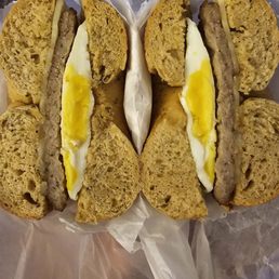 Sausage and egg on asiago with herbs garlic cream cheese on the side Sausage and egg on asiago with herbs garlic cream cheese on the side