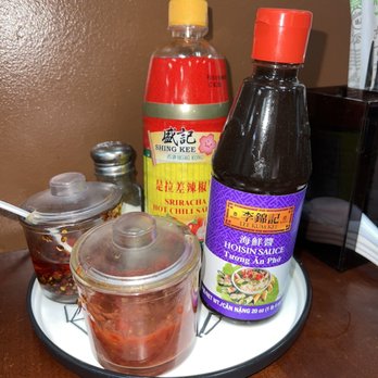 Pho Asian Cuisine - Sauces available on the table - Vietnamese Near Me - Manteca, California