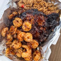 Baconessence - Grilled pork chop with blackened shrimp