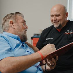 Texas Sedation Dental & Implant Center - Tyler - Waylon (on the right) is our Certified Nurse Anesthetist ready to help you with your dental fear and pain!